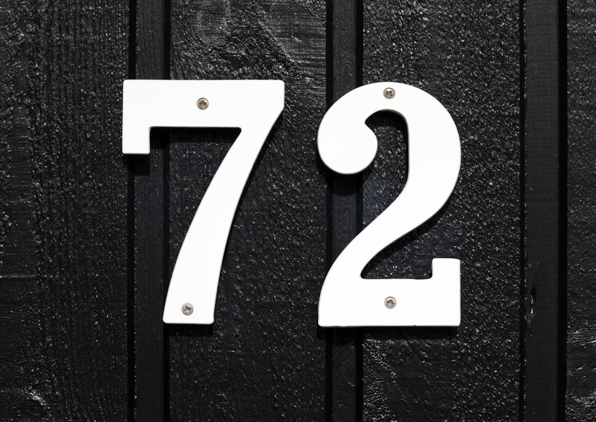 a number of white letters on a black surface